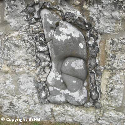 Siliceous concretions built into the  Hartwell Park walls. From a nearby 'white sand-pit' Morris describes the section in 1867 as follows: in descending order, of coarse ferruginous sand, sandy clay, fuller's earth., shaley clay and grey sand, large lenticular, but not continuous, masses of pisolitic hydrated oxide of iron, reposing on an uneven surface of white sand, containing large irregular hard siliceous concretions, assuming very grotesque forms called 'bowel-stones, this sand is about 20 feet thick...These concretions were used as ornaments in the neighbourhood...The sand has beem extensively worked, and sent to Birmingham for glass making, the finer and whiter portions have realized 1l. 1s. a ton, and other portions about 8s. to 12s. per ton. Large globes and prisms of glass, made from this sand, are in the Hartwell Museum'